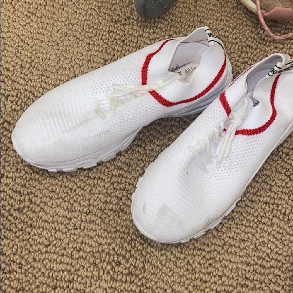 White fly knit shoes
